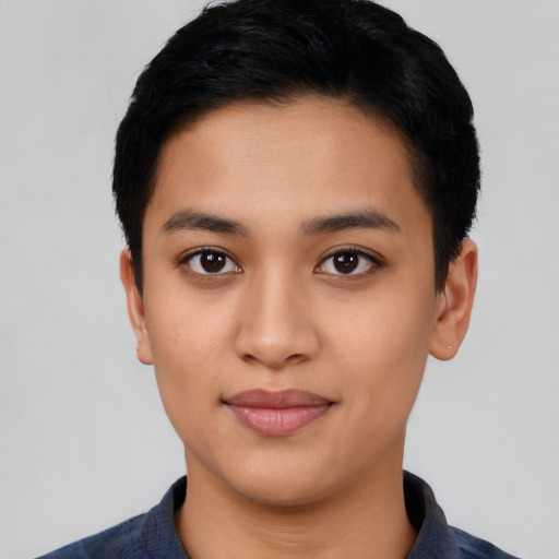 Joyful asian young-adult female with short  black hair and brown eyes