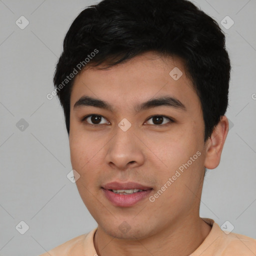 Joyful asian young-adult male with short  black hair and brown eyes