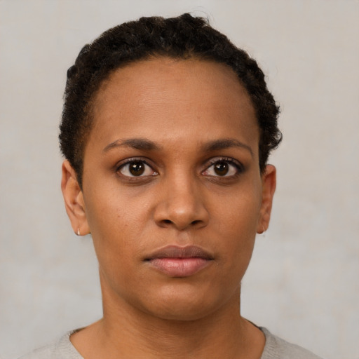 Neutral black young-adult female with short  brown hair and brown eyes