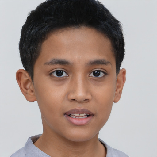 Joyful latino young-adult male with short  brown hair and brown eyes