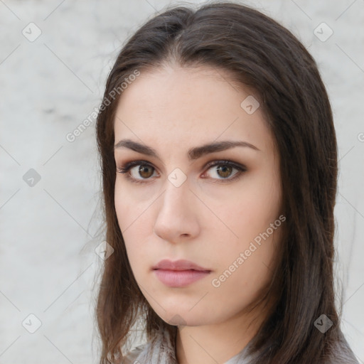 Neutral white young-adult female with long  brown hair and brown eyes