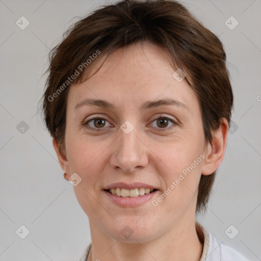 Joyful white adult female with medium  brown hair and brown eyes