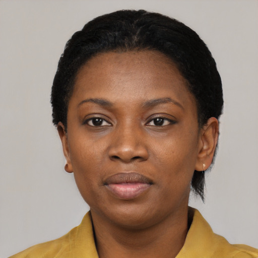Neutral black young-adult female with short  black hair and brown eyes