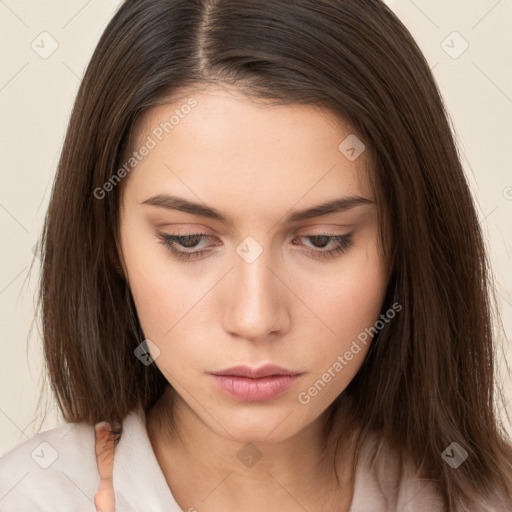 Neutral white young-adult female with long  brown hair and brown eyes