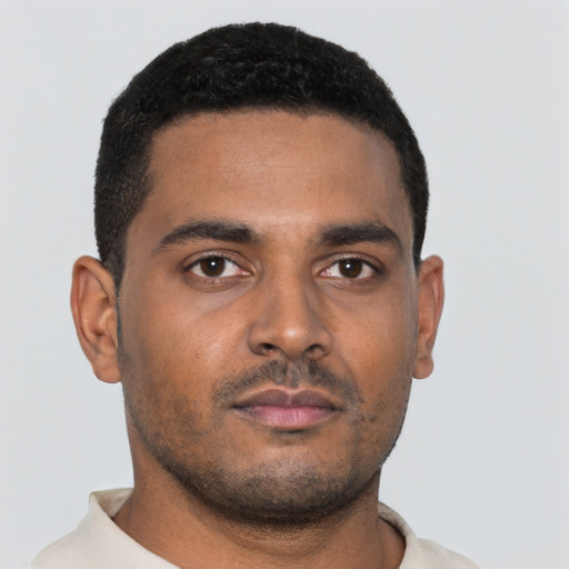 Neutral black young-adult male with short  black hair and brown eyes