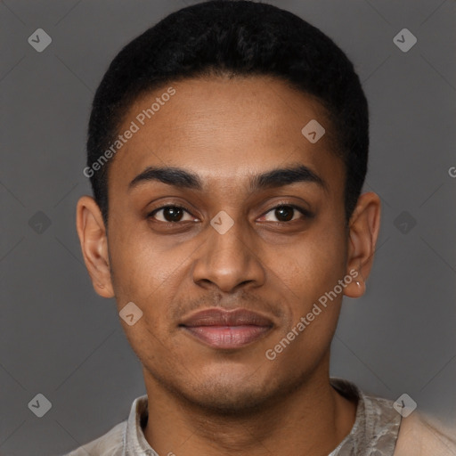 Joyful black young-adult male with short  black hair and brown eyes