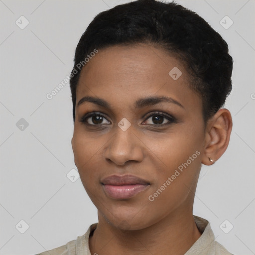 Joyful black young-adult female with short  black hair and brown eyes