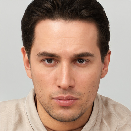 Neutral white young-adult male with short  brown hair and brown eyes