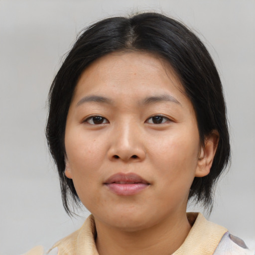 Neutral asian young-adult female with medium  brown hair and brown eyes