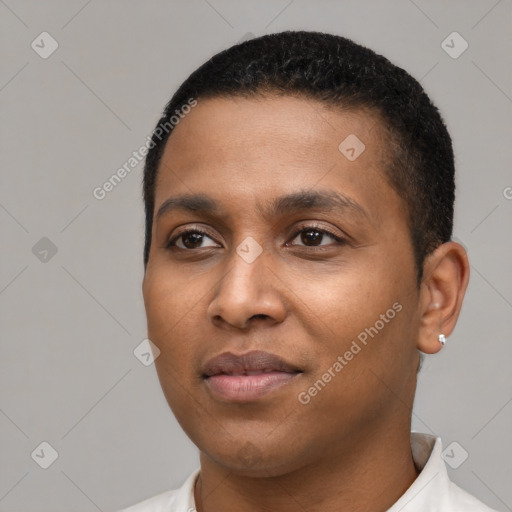 Joyful black young-adult male with short  black hair and brown eyes