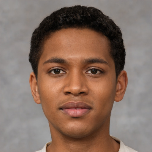 Neutral black young-adult male with short  black hair and brown eyes