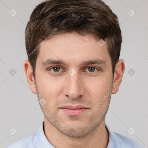 Neutral white young-adult male with short  brown hair and brown eyes