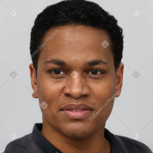 Joyful black young-adult male with short  black hair and brown eyes