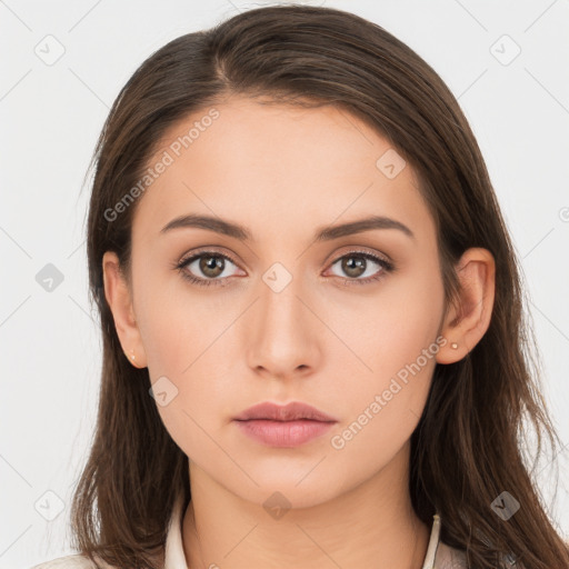 Neutral white young-adult female with long  brown hair and brown eyes