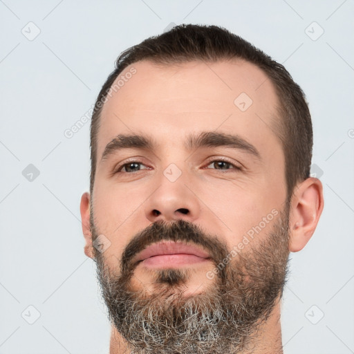 Neutral white young-adult male with short  black hair and brown eyes