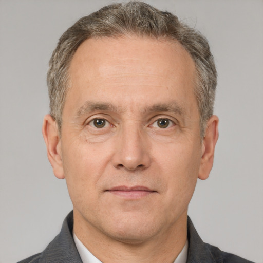 Neutral white middle-aged male with short  brown hair and brown eyes