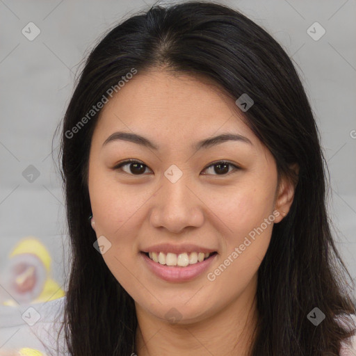 Joyful asian young-adult female with long  brown hair and brown eyes