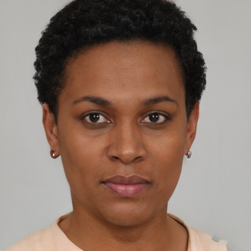 Neutral black young-adult female with short  brown hair and brown eyes