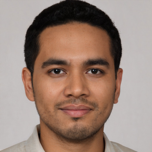 Neutral latino young-adult male with short  black hair and brown eyes