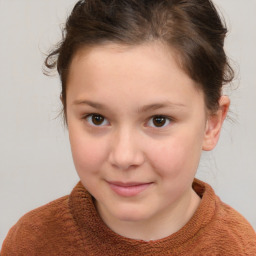 Joyful white child female with short  brown hair and brown eyes