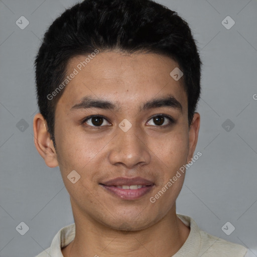 Joyful latino young-adult male with short  black hair and brown eyes