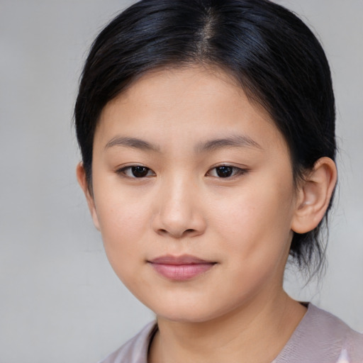 Neutral asian child female with medium  brown hair and brown eyes