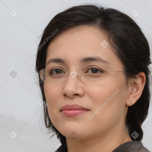 Joyful white adult female with medium  brown hair and brown eyes