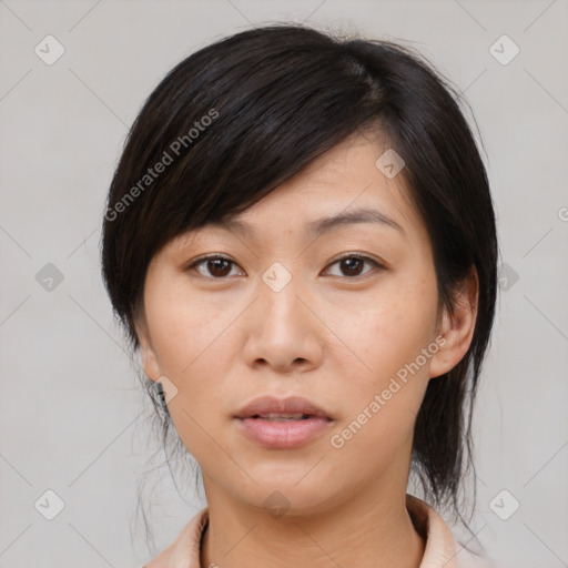 Neutral asian young-adult female with medium  brown hair and brown eyes