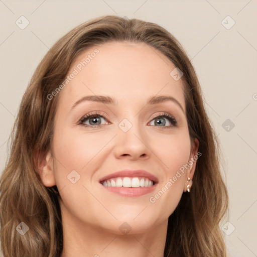 Joyful white young-adult female with long  brown hair and green eyes