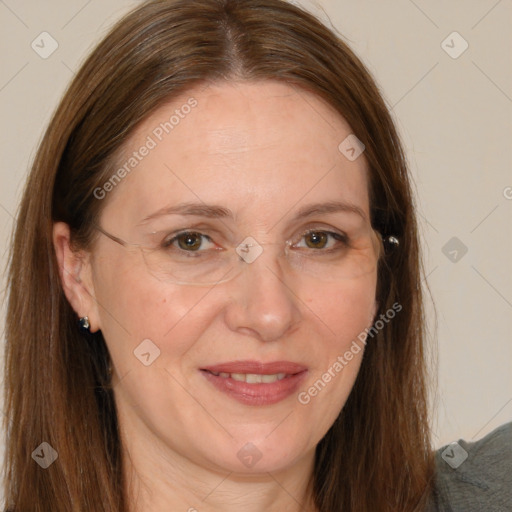 Joyful white adult female with long  brown hair and grey eyes