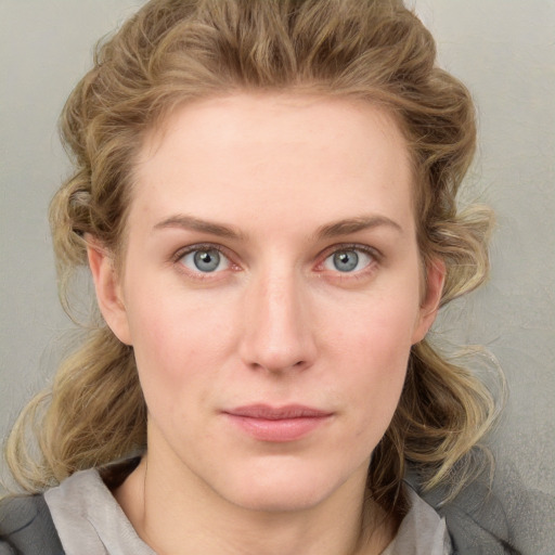 Neutral white young-adult female with medium  brown hair and blue eyes