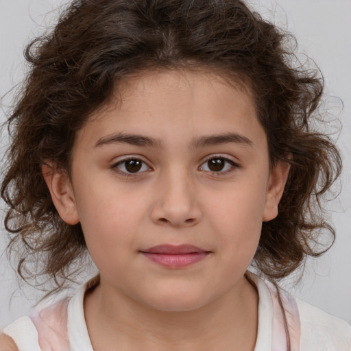 Joyful white child female with medium  brown hair and brown eyes