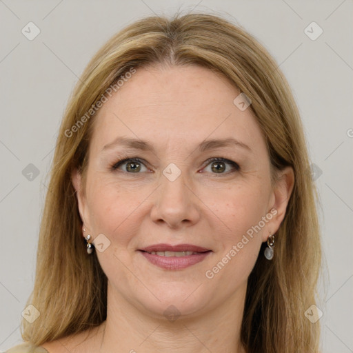 Joyful white adult female with medium  brown hair and grey eyes