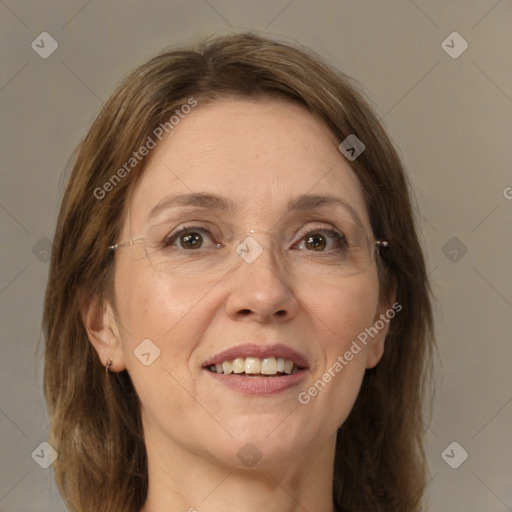 Joyful white adult female with medium  brown hair and grey eyes