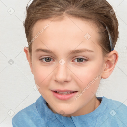 Joyful white child female with short  brown hair and brown eyes