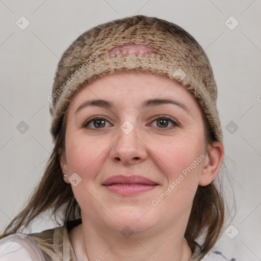 Joyful white young-adult female with medium  brown hair and grey eyes