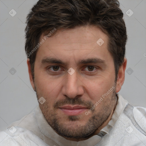 Joyful white adult male with short  brown hair and brown eyes