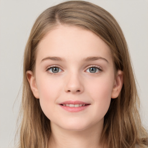 Joyful white child female with long  brown hair and grey eyes