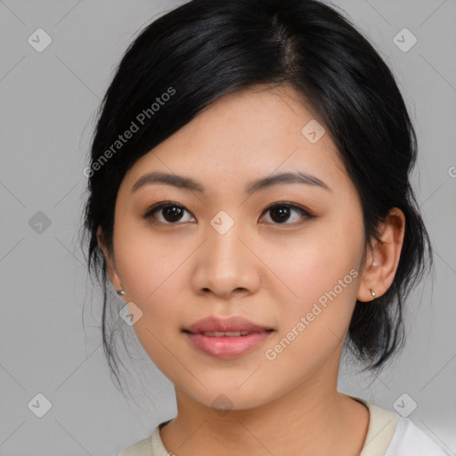 Joyful asian young-adult female with medium  black hair and brown eyes