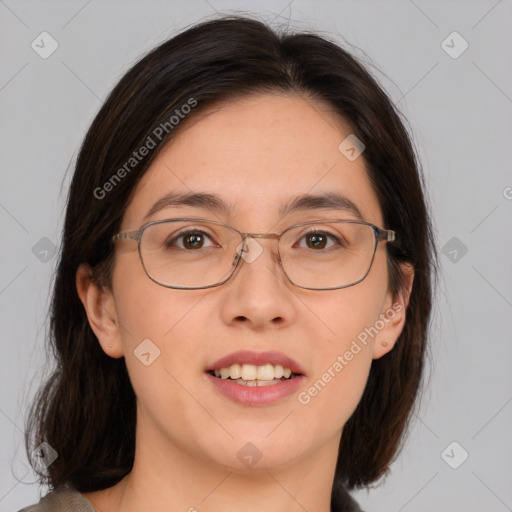 Joyful white adult female with medium  brown hair and brown eyes