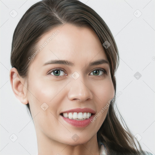 Joyful white young-adult female with long  brown hair and grey eyes