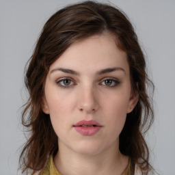 Neutral white young-adult female with medium  brown hair and brown eyes