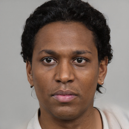 Neutral black young-adult female with short  black hair and brown eyes
