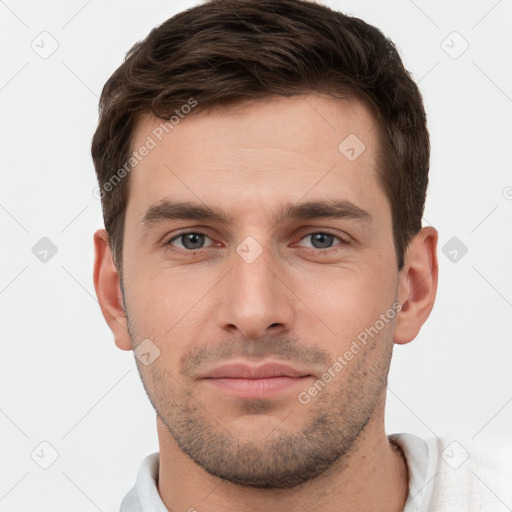 Neutral white young-adult male with short  brown hair and grey eyes