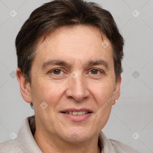 Joyful white adult male with short  brown hair and grey eyes