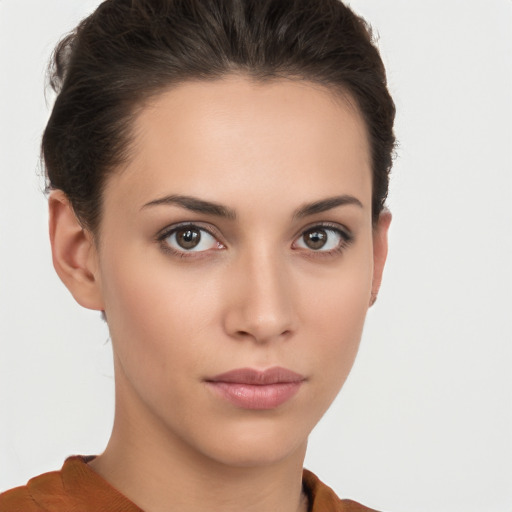 Neutral white young-adult female with short  brown hair and brown eyes