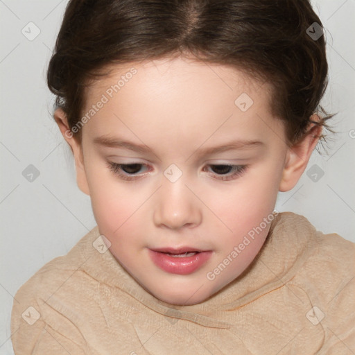 Joyful white child female with short  brown hair and brown eyes