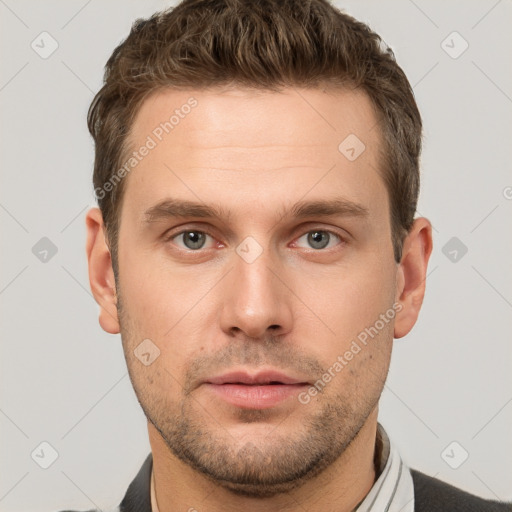 Neutral white young-adult male with short  brown hair and grey eyes