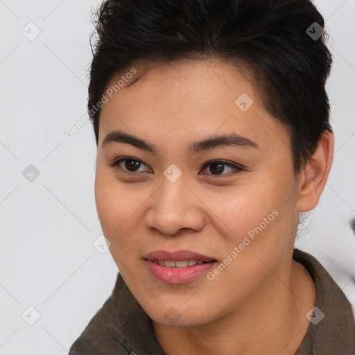 Joyful asian young-adult female with short  brown hair and brown eyes