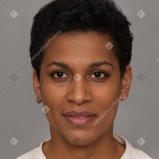 Joyful black young-adult female with short  black hair and brown eyes